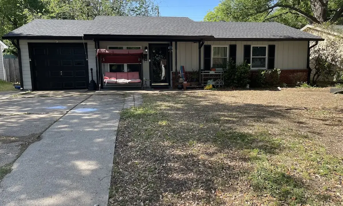 Hail Damage Roof Repair crew at work on a residential roof in Navasota